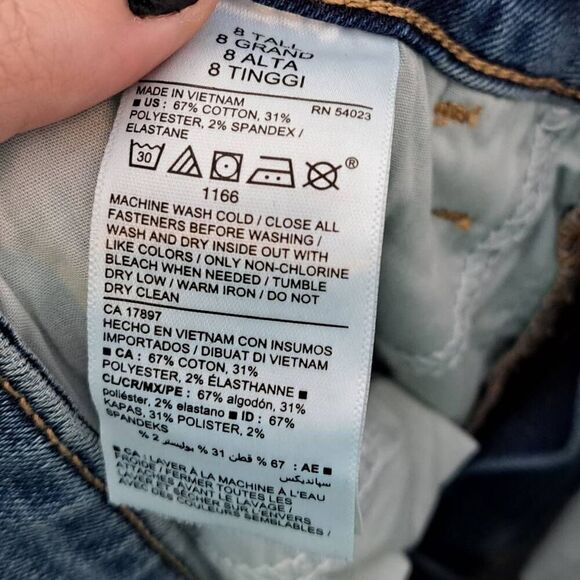 Old Navy Women's High-Waisted Distressed Pop Icon Skinny Jeans in Medium Indigo - Picture 8 of 9